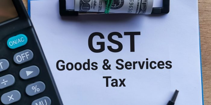 phrase-gst-goods-and-services-tax-written-on-paper-2022-11-08-08-37-41-utc